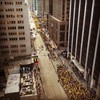 Workers gather at 47th Street and Sixth Ave