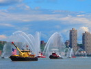 Fireboats spray water to celebrate as Enterprise makes its way up the Hudson